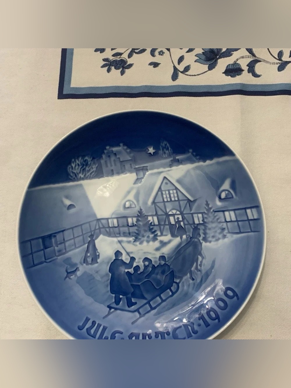 Royal Copenhagen Blue and White Holiday Plate with Winter Sleigh Scene